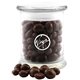 a clear jar with choc covered peanuts