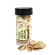 aerial view a clear tube with pistachios, image 1 of 6