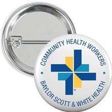 a white 1-1/4 round safety pin button