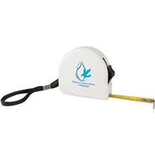 aerial view a white handyman locking 10 ft tape measure, image 1 of 4