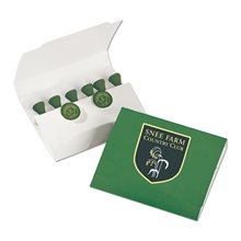 aerial view a group of premium basics golf tees and ball marker set, image 1 of 2