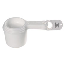 aerial view a white set of four measuring cups, image 1 of 4