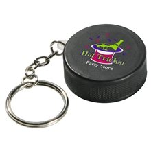 aerial view a black hockey puck key chain - stress reliever, image 1 of 2