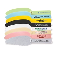 a group of plastic serrated cake dessert server