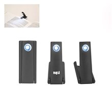 a black kikkerland mini folding booklight