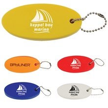a group of promotional custom sure - float key chain