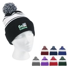 a group of two - tone knit pom beanie with cuff