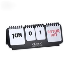 a black/white flip chart perpetual calendar month date day