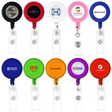 a group of round retractable badge holder