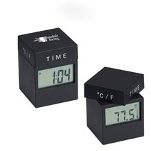 a black moma 4- in -1 black twist clock w / date, time, alarm, temperature, battery