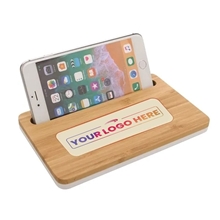 aerial view a group of bamboo wireless charging pad with phone stand, image 1 of 2