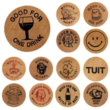 aerial view a group of 1-1/2 natural wood wooden nickel, image 1 of 6