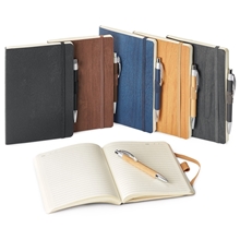 a group of ronan soft cover journal with pen