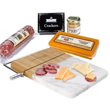 a white marble marble cutting board charcuterie set
