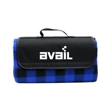 aerial view a blue + black checkered roll - up picnic blanket, image 1 of 2