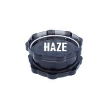 aerial view a black plastic cannabis grinder, image 1 of 6
