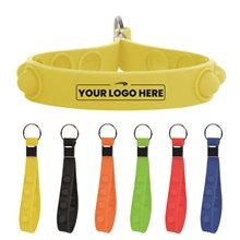 aerial view a group of push pop it stress reliever keychain, image 1 of 2