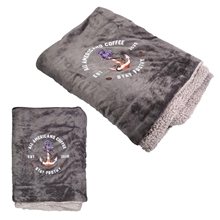 a grey sherpa fleece blanket