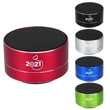 a group of hockey puck bluetooth speaker