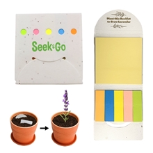 a white holder with yellow sticky pad and orange/blue/yellow/pink/green sticky note tabs eco - friendly plantable sticky note holder