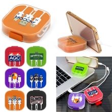 aerial view a group of 3 piece charging cable set with phone holder, image 1 of 2