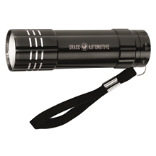 aerial view a black ultra bright mini flashlight, image 1 of 3