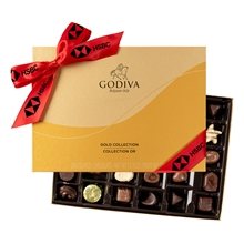 a group of godiva ballotin gold 36 piece assortment box