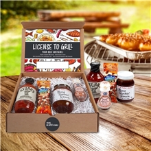 a group of license to grill - bbq gourmet kit with apron