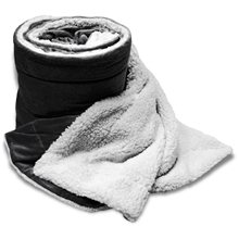 a black oversized mink sherpa blanket