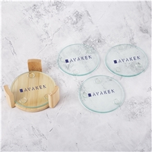 a group of round glass coasters 5 piece set with wood stand