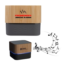 a group of cadence bamboo wireless light - up speaker