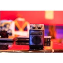 aerial view a group of fusionbeat 3- in -1 device earbuds, speaker powerbank, image 1 of 5