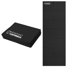 aerial view a black foldable lotus bound yoga mat, image 1 of 2