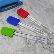 aerial view a group of clear handle silicone spatula, image 1 of 4