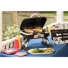 a group of cuisinart outdoors(r) petite gourmet portable gas grill