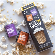 a group of whats popn gourmet popcorn gift set