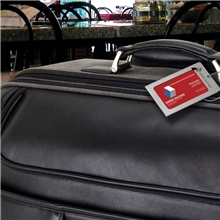 a group of navigor series steel luggage tag