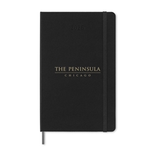aerial view a black moleskine(r) hard cover large 12- month daily 2025 planner, image 1 of 7