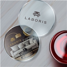 aerial view a group of round glass coasters single, image 1 of 2