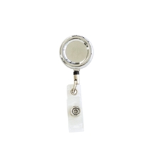 aerial view a silver metal badge reel w / back clip, image 1 of 2