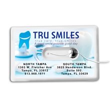 aerial view a white 44 yards credit card size dental floss dispenser with mirror and pouch, image 1 of 4