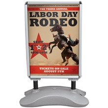 aerial view a white outdoor flex sign with ballast base kit, image 1 of 8