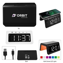 a group of 15w light - up wireless charger alarm clock