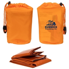 aerial view a orange easy - pak emergency poncho with whistle, image 1 of 2