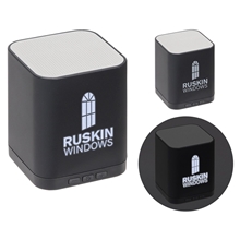 a group of orion light - up logo bluetooth speaker