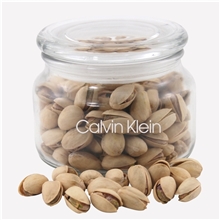 a clear glass jar jar with pistachios