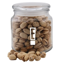 a clear glass jar jar with pistachios