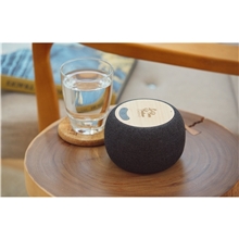 aerial view a group of garm empire bamboo wireless speaker with 5w wireless charger, image 1 of 3