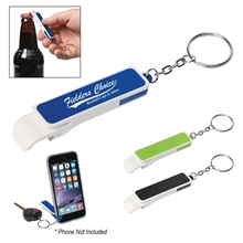 a group of bottle opener / phone stand key chain