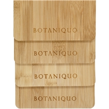 aerial view a natural cutting board with handle, image 1 of 3